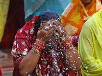 Hindu devotees perform rituals of the 'Chhath Puja' festival at the Shrine Galta Ji temple Kund in Jaipur, Rajasthan, India, on November 7,...