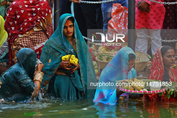 Hindu devotees perform rituals of the 'Chhath Puja' festival at the Shrine Galta Ji temple Kund in Jaipur, Rajasthan, India, on November 7,...