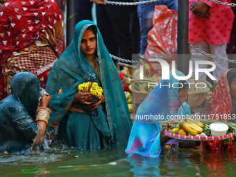 Hindu devotees perform rituals of the 'Chhath Puja' festival at the Shrine Galta Ji temple Kund in Jaipur, Rajasthan, India, on November 7,...