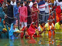 Hindu devotees perform rituals of the 'Chhath Puja' festival at the Shrine Galta Ji temple Kund in Jaipur, Rajasthan, India, on November 7,...