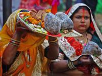 Hindu devotees perform rituals of the 'Chhath Puja' festival at the Shrine Galta Ji temple Kund in Jaipur, Rajasthan, India, on November 7,...