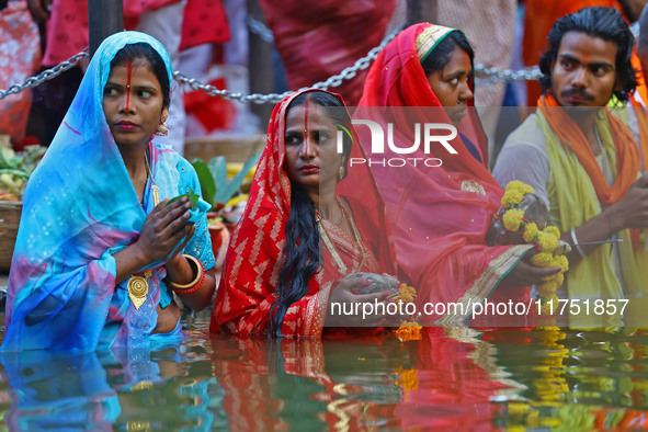 Hindu devotees perform rituals of the 'Chhath Puja' festival at the Shrine Galta Ji temple Kund in Jaipur, Rajasthan, India, on November 7,...