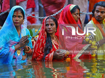 Hindu devotees perform rituals of the 'Chhath Puja' festival at the Shrine Galta Ji temple Kund in Jaipur, Rajasthan, India, on November 7,...