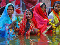 Hindu devotees perform rituals of the 'Chhath Puja' festival at the Shrine Galta Ji temple Kund in Jaipur, Rajasthan, India, on November 7,...