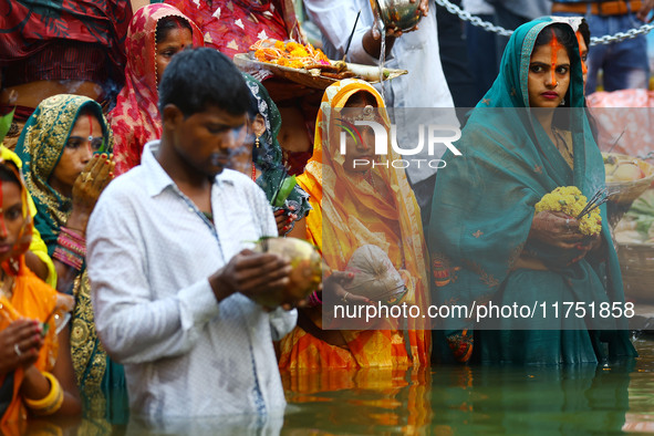 Hindu devotees perform rituals of the 'Chhath Puja' festival at the Shrine Galta Ji temple Kund in Jaipur, Rajasthan, India, on November 7,...