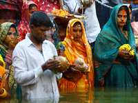 Hindu devotees perform rituals of the 'Chhath Puja' festival at the Shrine Galta Ji temple Kund in Jaipur, Rajasthan, India, on November 7,...