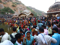 Hindu devotees perform rituals of the 'Chhath Puja' festival at the Shrine Galta Ji temple Kund in Jaipur, Rajasthan, India, on November 7,...