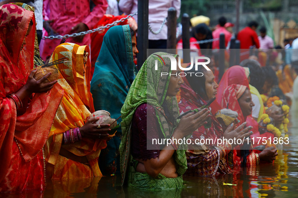 Hindu devotees perform rituals of the 'Chhath Puja' festival at the Shrine Galta Ji temple Kund in Jaipur, Rajasthan, India, on November 7,...