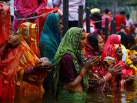 Hindu devotees perform rituals of the 'Chhath Puja' festival at the Shrine Galta Ji temple Kund in Jaipur, Rajasthan, India, on November 7,...