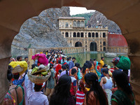 Hindu devotees perform rituals of the 'Chhath Puja' festival at the Shrine Galta Ji temple Kund in Jaipur, Rajasthan, India, on November 7,...