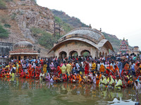 Hindu devotees perform rituals of the 'Chhath Puja' festival at the Shrine Galta Ji temple Kund in Jaipur, Rajasthan, India, on November 7,...