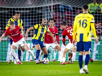 AZ Alkmaar defender Maxim Dekker and Fenerbahce midfielder Sofyan Amrabat play during the match between AZ and Fenerbahce at the AFAS stadiu...