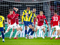 AZ Alkmaar defender Maxim Dekker and Fenerbahce midfielder Sofyan Amrabat play during the match between AZ and Fenerbahce at the AFAS stadiu...