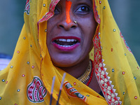 A Hindu devotee performs rituals of the 'Chhath Puja' festival at the Shrine Galta Ji temple Kund in Jaipur, Rajasthan, India, on November 7...