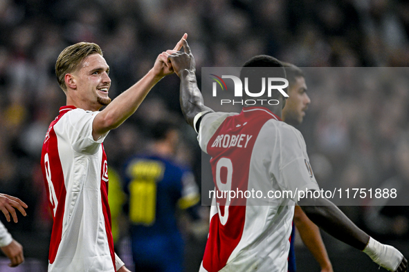 AFC Ajax Amsterdam midfielder Kenneth Taylor and AFC Ajax Amsterdam forward Brian Brobbey celebrate the 2-0 goal during the match between Aj...