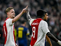 AFC Ajax Amsterdam midfielder Kenneth Taylor and AFC Ajax Amsterdam forward Brian Brobbey celebrate the 2-0 goal during the match between Aj...