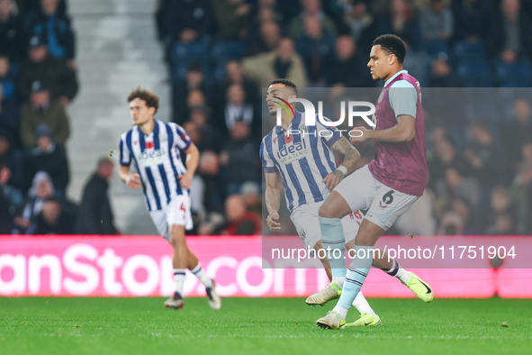 CJ Egan-Riley of Burnley is in action during the Sky Bet Championship match between West Bromwich Albion and Burnley at The Hawthorns in Wes...