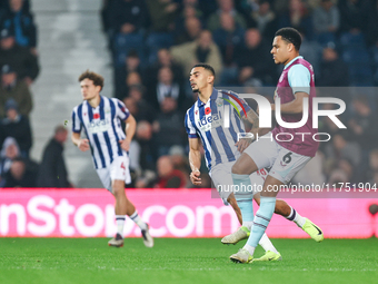 CJ Egan-Riley of Burnley is in action during the Sky Bet Championship match between West Bromwich Albion and Burnley at The Hawthorns in Wes...