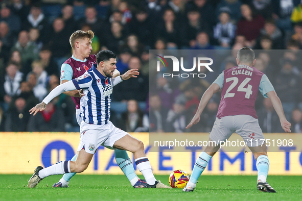 Number 27, Alex Mowatt of WBA, is in defensive action during the Sky Bet Championship match between West Bromwich Albion and Burnley at The...