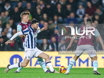 Number 27, Alex Mowatt of WBA, is in defensive action during the Sky Bet Championship match between West Bromwich Albion and Burnley at The...