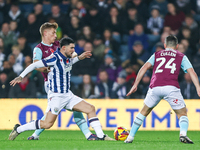 Number 27, Alex Mowatt of WBA, is in defensive action during the Sky Bet Championship match between West Bromwich Albion and Burnley at The...