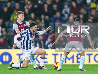 Number 27, Alex Mowatt of WBA, is in defensive action during the Sky Bet Championship match between West Bromwich Albion and Burnley at The...