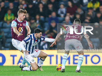 Number 27, Alex Mowatt of WBA, is in defensive action during the Sky Bet Championship match between West Bromwich Albion and Burnley at The...