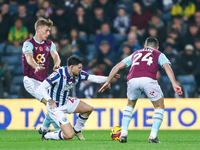 Number 27, Alex Mowatt of WBA, is in defensive action during the Sky Bet Championship match between West Bromwich Albion and Burnley at The...