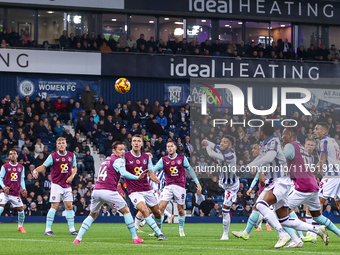 Mason Holgate of WBA is in action in the air during the Sky Bet Championship match between West Bromwich Albion and Burnley at The Hawthorns...