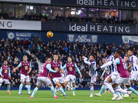 Mason Holgate of WBA is in action in the air during the Sky Bet Championship match between West Bromwich Albion and Burnley at The Hawthorns...