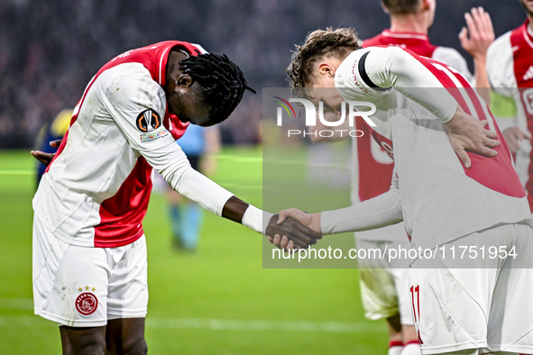 AFC Ajax Amsterdam forwards Bertrand Traore and Mika Godts celebrate the 3-0 goal during the match between Ajax and Maccabi Tel Aviv at the...