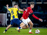 Fenerbahce midfielder Ismail Yusek and AZ Alkmaar midfielder Dave Kwakman play during the match AZ - Fenerbahce at the AFAS stadium for the...