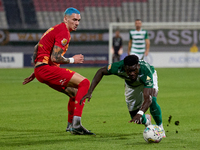 In Ta' Qali, Malta, on November 7, 2024, Franklin Sasere of Floriana moves away with the ball ahead of Alessandro Coppola of Birkirkara duri...