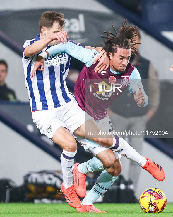 #8, Jayson Molumby of WBA and #30, Luca Koleosho of Burnley battle for possession during the Sky Bet Championship match between West Bromwic...