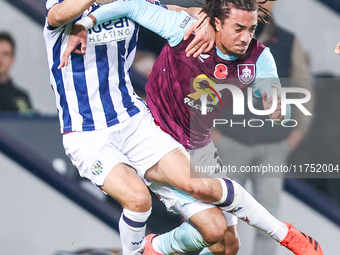 #8, Jayson Molumby of WBA and #30, Luca Koleosho of Burnley battle for possession during the Sky Bet Championship match between West Bromwic...