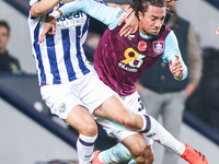 #8, Jayson Molumby of WBA and #30, Luca Koleosho of Burnley battle for possession during the Sky Bet Championship match between West Bromwic...