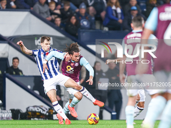 #8, Jayson Molumby of WBA and #30, Luca Koleosho of Burnley battle for possession during the Sky Bet Championship match between West Bromwic...