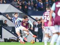 #8, Jayson Molumby of WBA and #30, Luca Koleosho of Burnley battle for possession during the Sky Bet Championship match between West Bromwic...