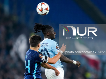 Francisco Moura of FC Porto and Loum Tchaouna of SS Lazio jump for the ball during the UEFA Europa League 2024/25 League Phase MD4 match bet...