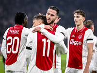 AFC Ajax Amsterdam forward Mika Godts and AFC Ajax Amsterdam midfielder Branco van den Boomen celebrate the 3-0 goal during the match betwee...