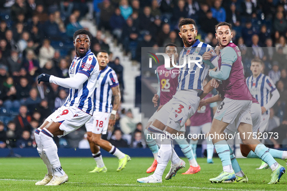 Josh Maja (#9), Mason Holgate (#3) of WBA, and Josh Brownhill (#8) of Burnley are in action during the Sky Bet Championship match between We...