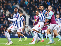 Josh Maja (#9), Mason Holgate (#3) of WBA, and Josh Brownhill (#8) of Burnley are in action during the Sky Bet Championship match between We...