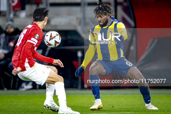 AZ Alkmaar defender Seiya Maikuma and Fenerbahce forward Allan Saint-Maximin play during the match between AZ and Fenerbahce at the AFAS Sta...