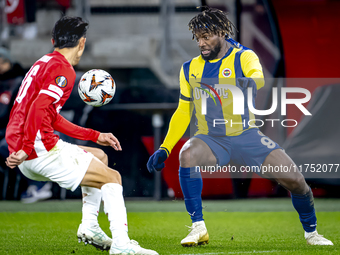 AZ Alkmaar defender Seiya Maikuma and Fenerbahce forward Allan Saint-Maximin play during the match between AZ and Fenerbahce at the AFAS Sta...