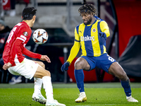 AZ Alkmaar defender Seiya Maikuma and Fenerbahce forward Allan Saint-Maximin play during the match between AZ and Fenerbahce at the AFAS Sta...