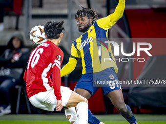 AZ Alkmaar defender Seiya Maikuma and Fenerbahce forward Allan Saint-Maximin play during the match between AZ and Fenerbahce at the AFAS Sta...