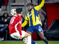 AZ Alkmaar defender Seiya Maikuma and Fenerbahce forward Allan Saint-Maximin play during the match between AZ and Fenerbahce at the AFAS Sta...