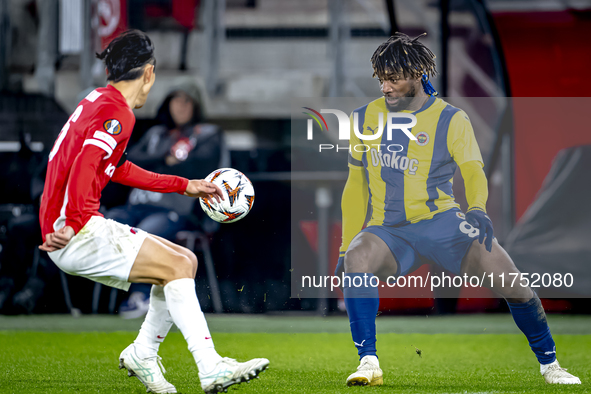 AZ Alkmaar defender Seiya Maikuma and Fenerbahce forward Allan Saint-Maximin play during the match between AZ and Fenerbahce at the AFAS Sta...