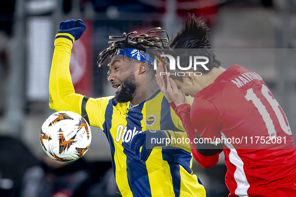 AZ Alkmaar defender Seiya Maikuma and Fenerbahce forward Allan Saint-Maximin play during the match between AZ and Fenerbahce at the AFAS Sta...