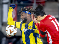 AZ Alkmaar defender Seiya Maikuma and Fenerbahce forward Allan Saint-Maximin play during the match between AZ and Fenerbahce at the AFAS Sta...